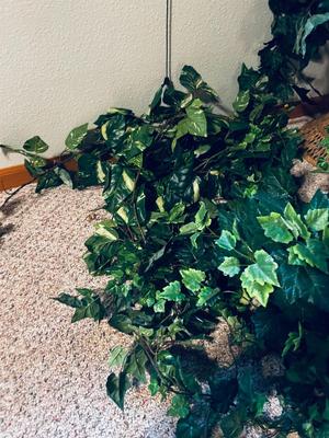 FAUX FOLIAGE AND ACCOMPANYING WICKER ITEMS