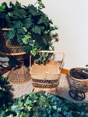 FAUX FOLIAGE AND ACCOMPANYING WICKER ITEMS