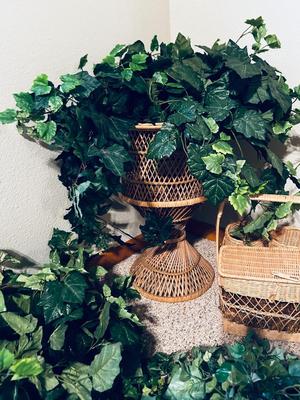 FAUX FOLIAGE AND ACCOMPANYING WICKER ITEMS