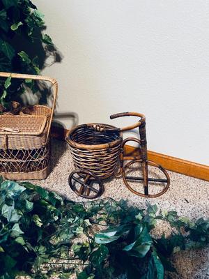 FAUX FOLIAGE AND ACCOMPANYING WICKER ITEMS