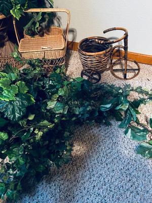FAUX FOLIAGE AND ACCOMPANYING WICKER ITEMS