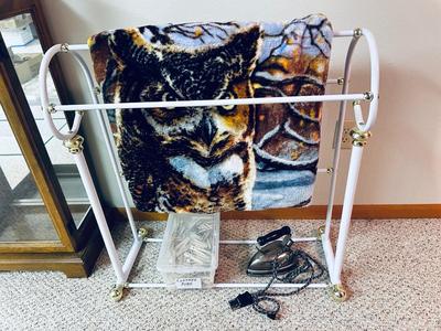 OLD UNIVERSAL ELECTRIC IRON WITH STAND, QUILT RACK, CLOTHES PINS, JAMES A MEGER ART THROW BLANKET