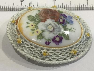 White With yellow Baby Rose with large Painted Floral Scence on Ceramic/porcelin.