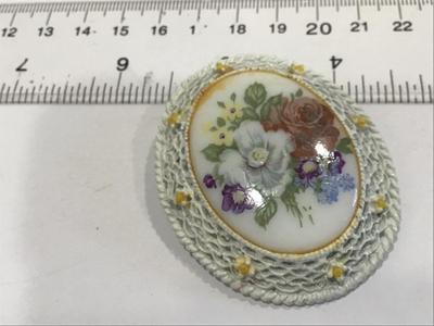 White With yellow Baby Rose with large Painted Floral Scence on Ceramic/porcelin.