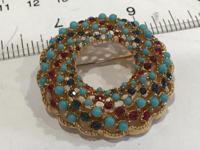 Song of India wreath brooch