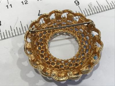 Song of India wreath brooch