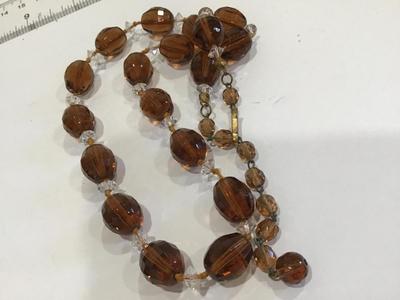 West Germany Fauceted Amber Glass With clear Crystal Spacers