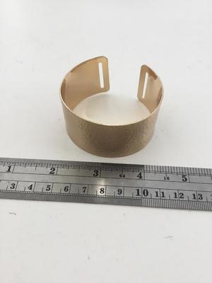 Gold tone fashion cuff
