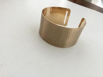 Gold tone fashion cuff