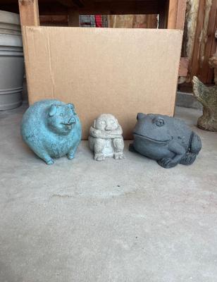 Three stone garden statues