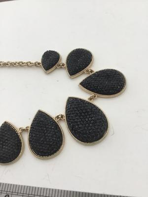 Gold tone black fashion necklace