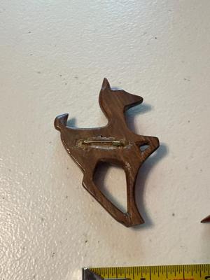 Wooden carved brooches