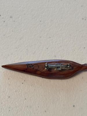 Wooden carved brooches