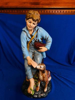 1970’s HOLLAND MOLD CERAMIC STATUE OF A BOY FEEDING HIS DOG
