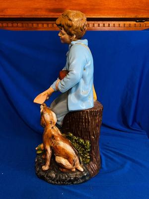 1970’s HOLLAND MOLD CERAMIC STATUE OF A BOY FEEDING HIS DOG