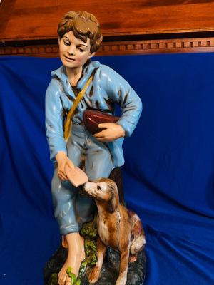 1970’s HOLLAND MOLD CERAMIC STATUE OF A BOY FEEDING HIS DOG