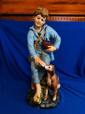1970’s HOLLAND MOLD CERAMIC STATUE OF A BOY FEEDING HIS DOG