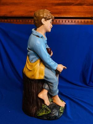 1970’s HOLLAND MOLD CERAMIC STATUE OF A BOY FEEDING HIS DOG