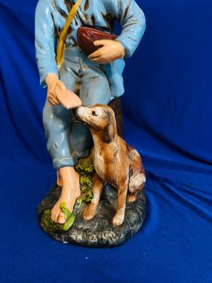1970’s HOLLAND MOLD CERAMIC STATUE OF A BOY FEEDING HIS DOG