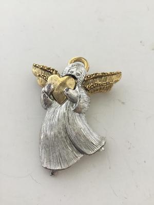 LC marked angel brooch