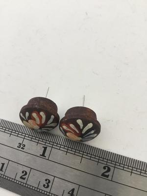 Unmarked brown stud hand painted earrings