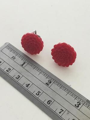 Unmarked red roses clip on earrings