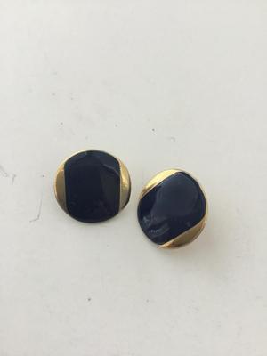 Gold tone round statement earrings