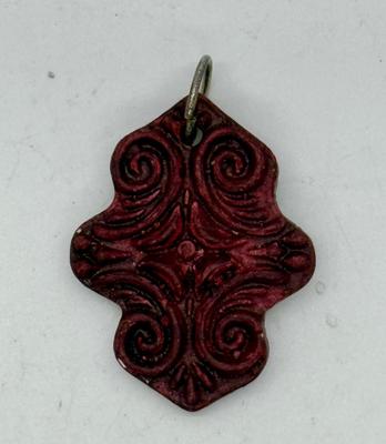 Vintage Wood Pendant with scrollwork pattern