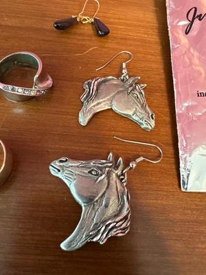 Miscellaneous jewelry lot, gift bags and silver polisher