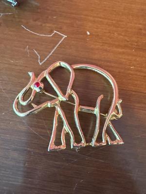Sale Photo Thumbnail #618: Brooches and a bracelet