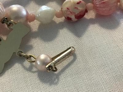 Beautiful vintage Hong Kong, three strand pink tone necklace