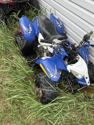 O1-2013 Polaris outlaw 50, 4 wheeler has title