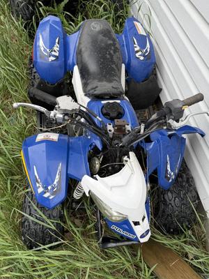 O1-2013 Polaris outlaw 50, 4 wheeler has title