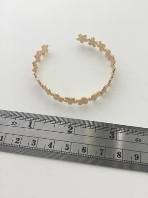 Beautiful gold tone flower cuff bracelet