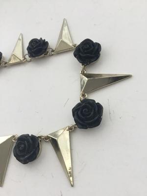 Gold tone black floral fashion necklace