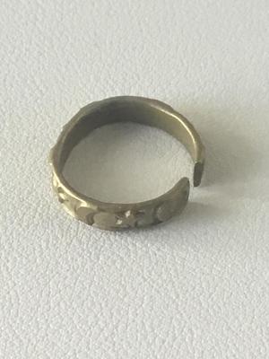 Gold tone unmarked star and moon ring