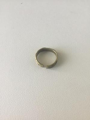 Gold tone unmarked star and moon ring