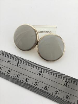 Beautiful light gray round statement earrings