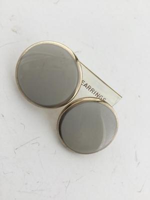 Beautiful light gray round statement earrings
