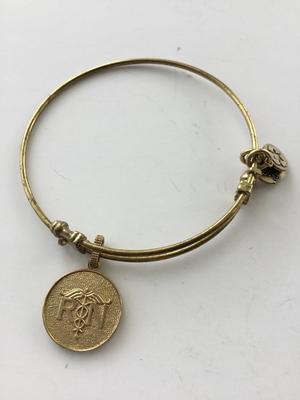 Angelica marked RN charm bracelet