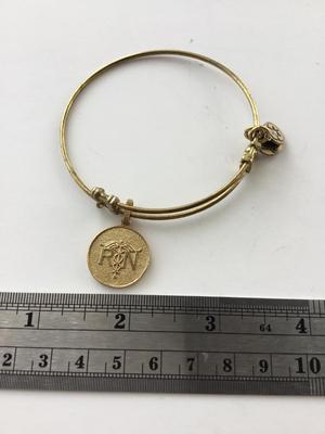 Angelica marked RN charm bracelet
