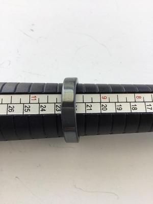 Unmarked men’s black ring