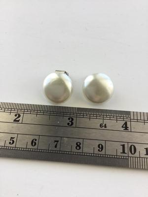 Vintage small white clip on earrings