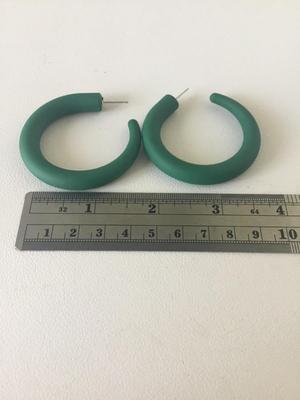 Green statement hoop earrings