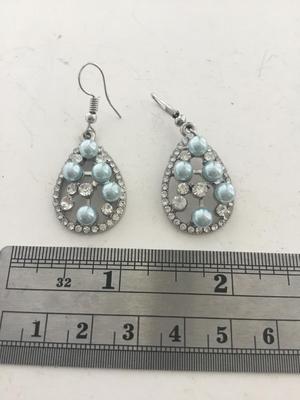 Silver tone light blue dangle fashion earrings