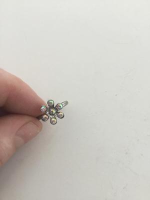 Unmarked adjustable flower ring
