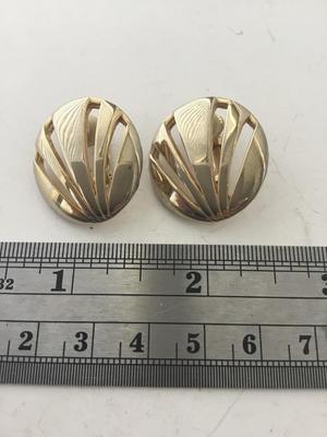Gold tone round clip on earrings
