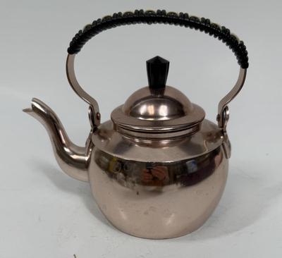 Sale Photo Thumbnail #226: From the 1960's. Great vintage condition. Approx. 7" high to top of handle, 8" wide including spout.
Holds approx. 1 Liter/1 Quart, Good condition.