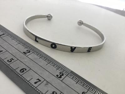 Love silver tone fashion cuff