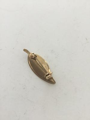 Gold tone leaf pin
